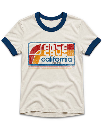 An off-white ringer t-shirt with navy blue collar and sleeve cuffs, featuring a distressed retro graphic on the chest that reads 'Fenta Cruz California since 2016' in red, orange, and blue.